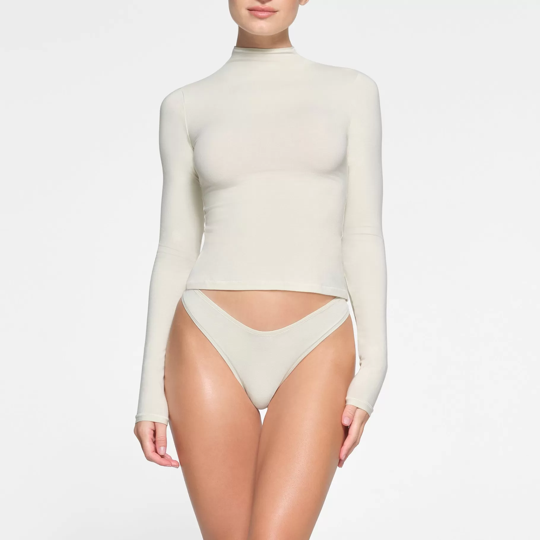 Skims cotton collection*COTTON JERSEY LONG SLEEVE TURTLENECK | BONE