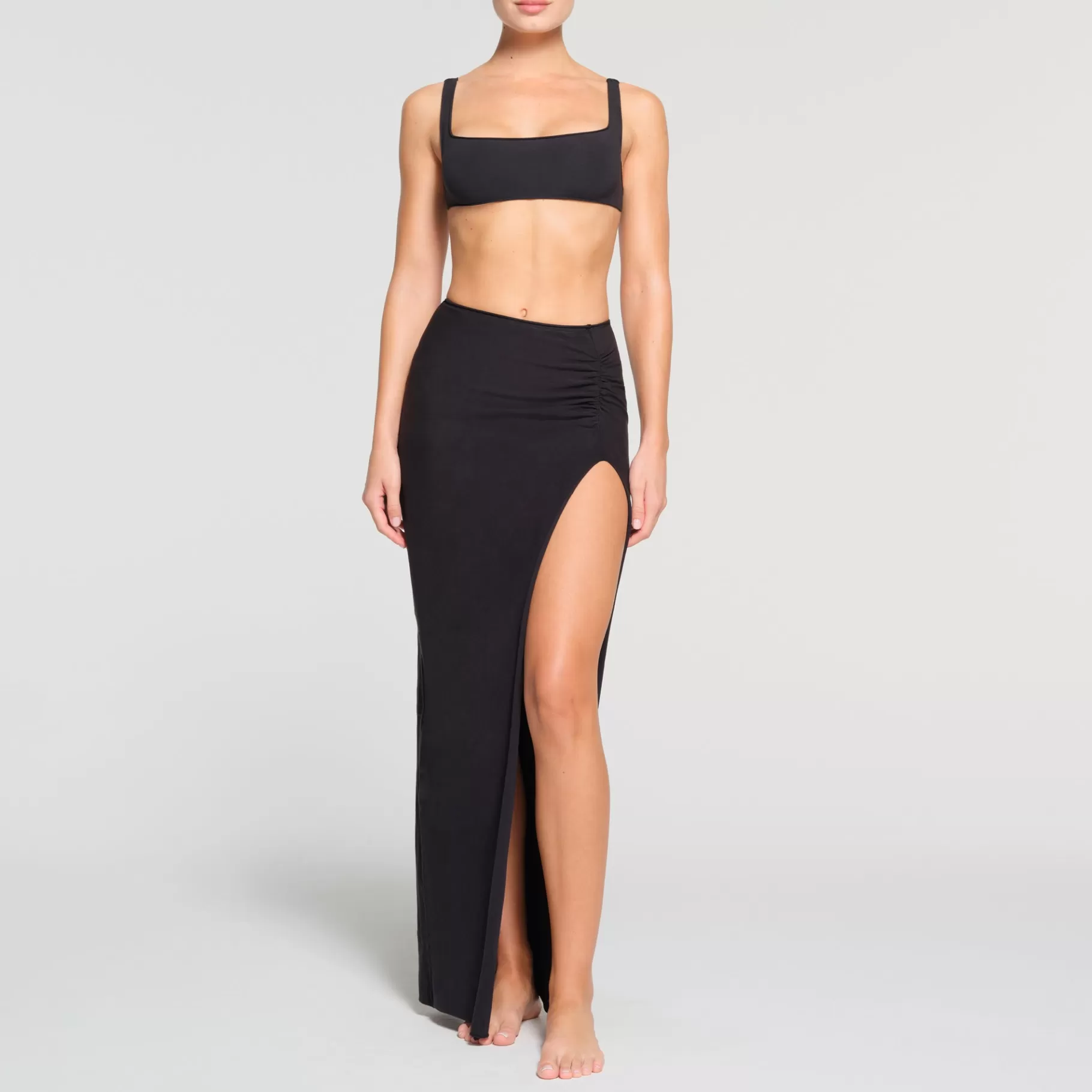 Skims skirts*RAW EDGE SLIT LONG SKIRT | ONYX