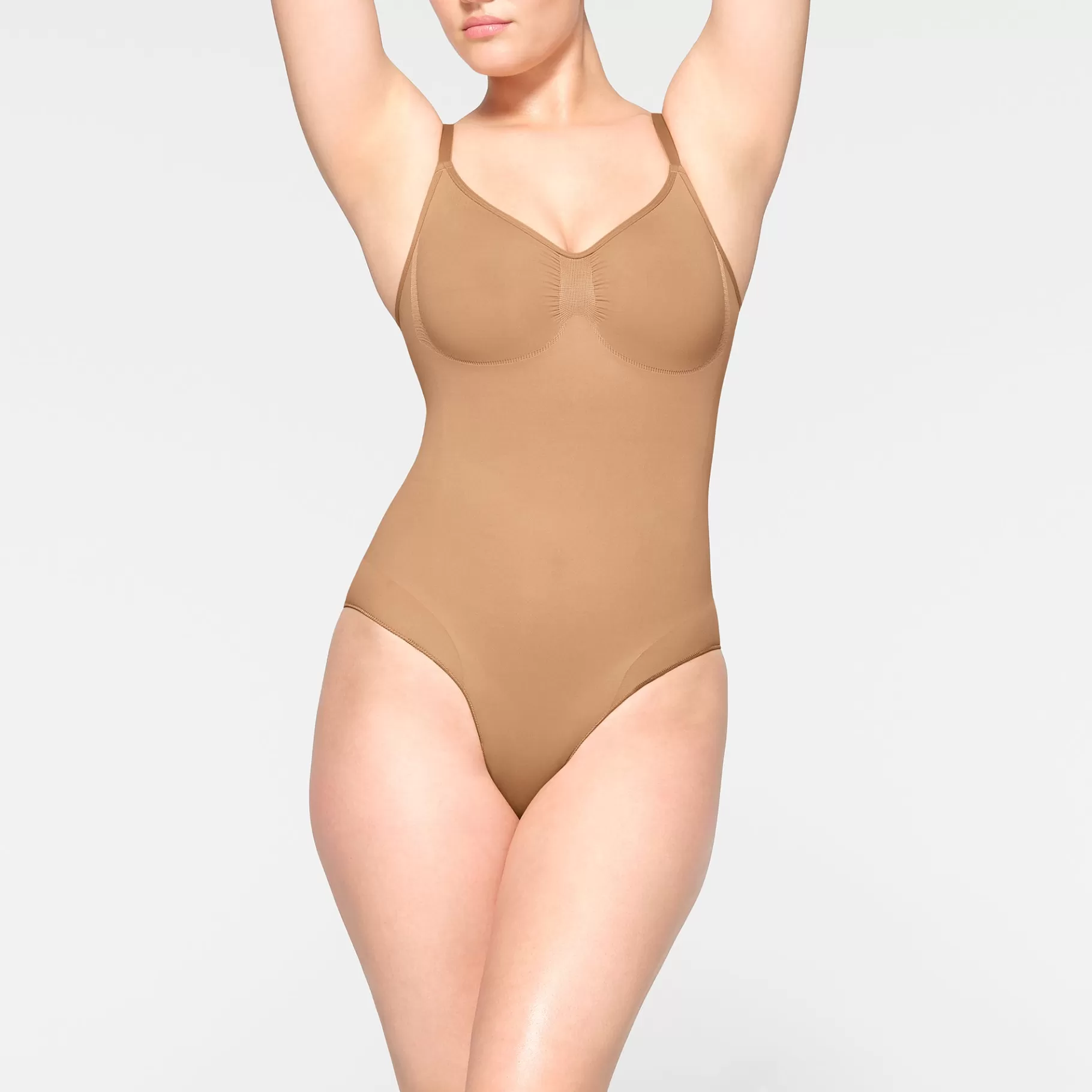 Skims shapewear bodysuits*SEAMLESS SCULPT BRIEF BODYSUIT | OCHRE