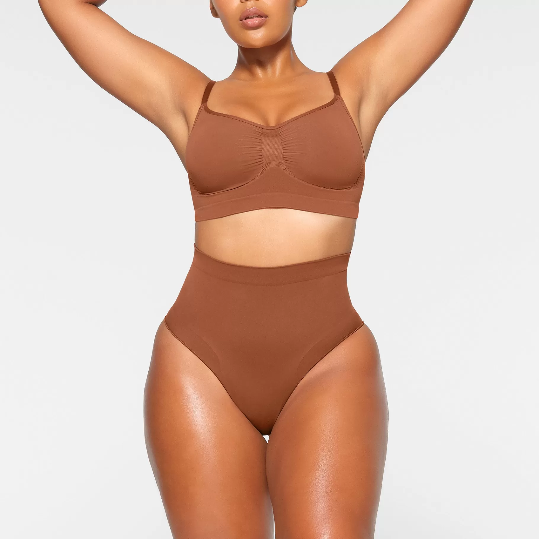 Skims shaping underwear*SEAMLESS SCULPT MID WAIST BRIEF | BRONZE