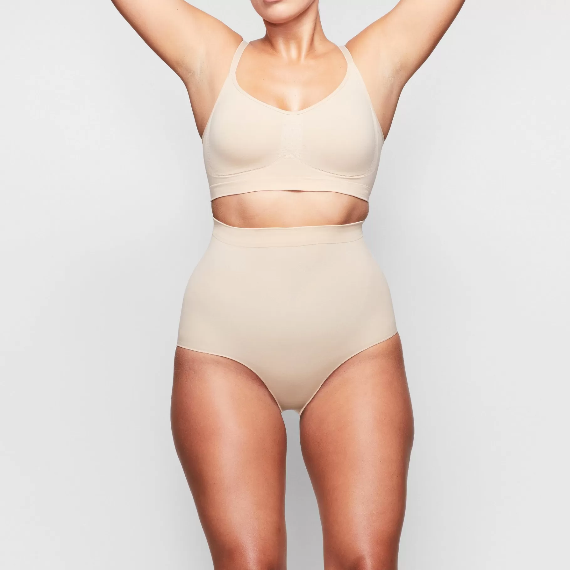 Skims shaping underwear*SEAMLESS SCULPT MID WAIST BRIEF | CLAY