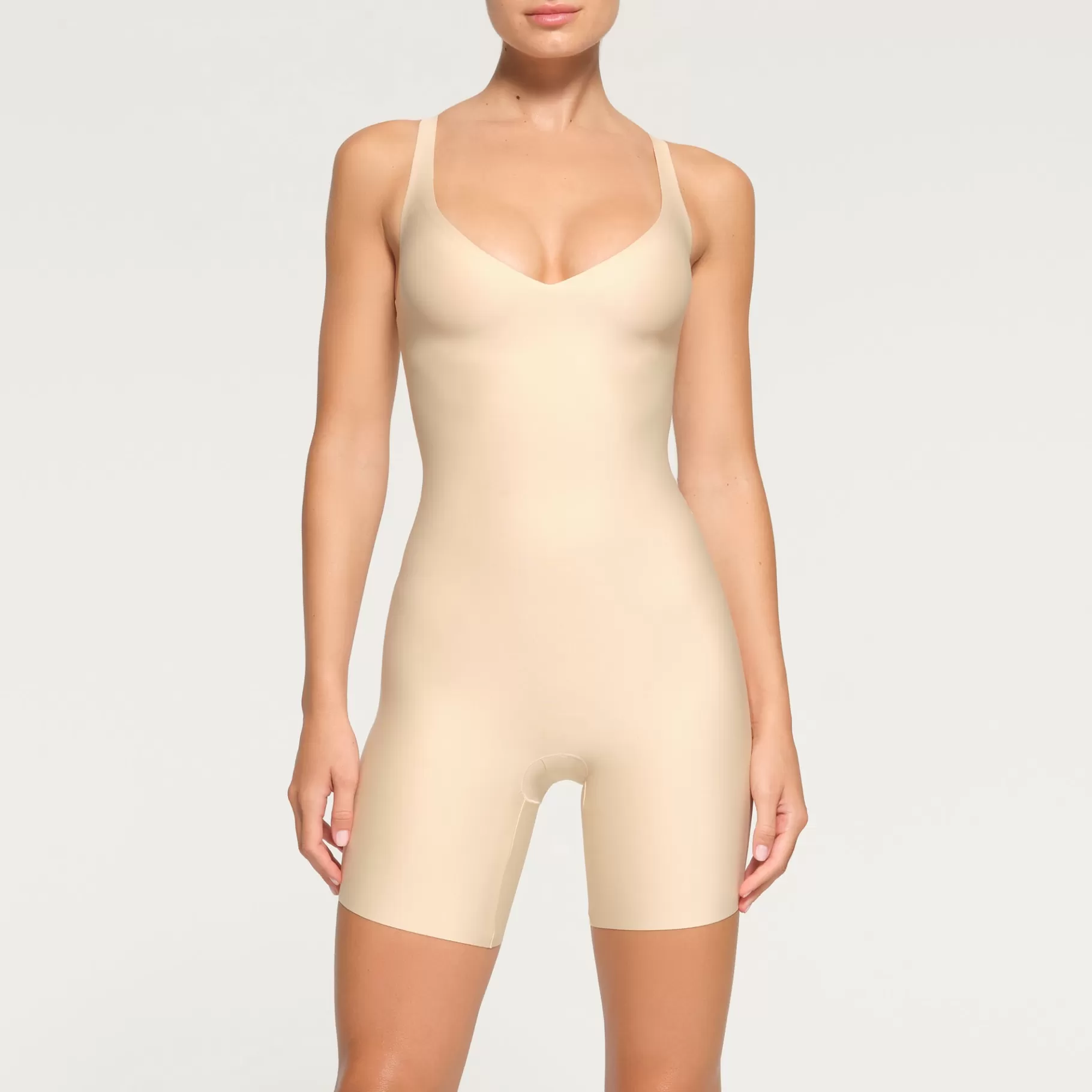 Skims catsuits & onesies* BODY UNLINED PLUNGE MID THIGH BODYSUIT | SAND