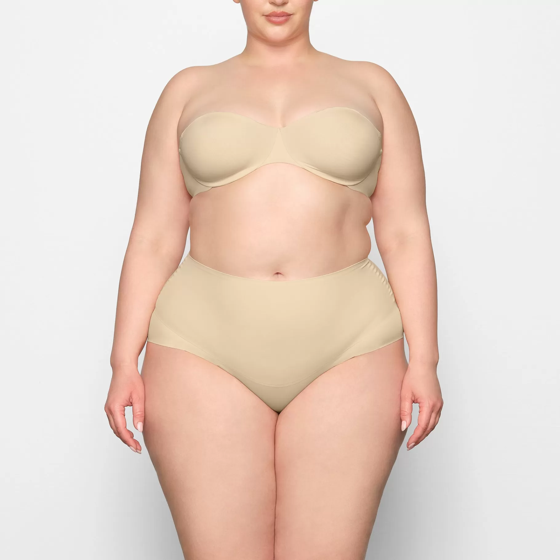 Skims unlined*SMOOTHING INTIMATES UNLINED STRAPLESS BRA | SAND