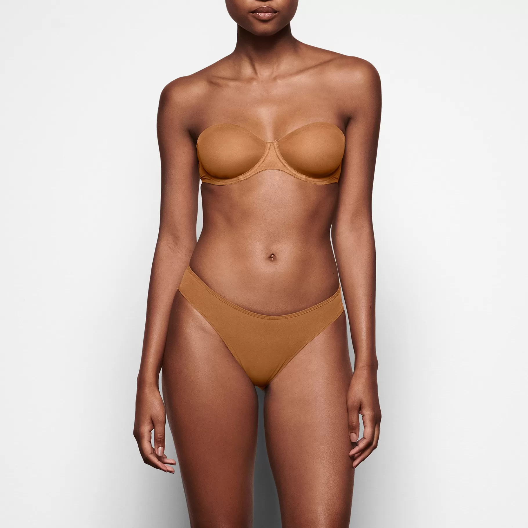 Skims unlined*ULTRA FINE MESH STRAPLESS BRA | BRONZE